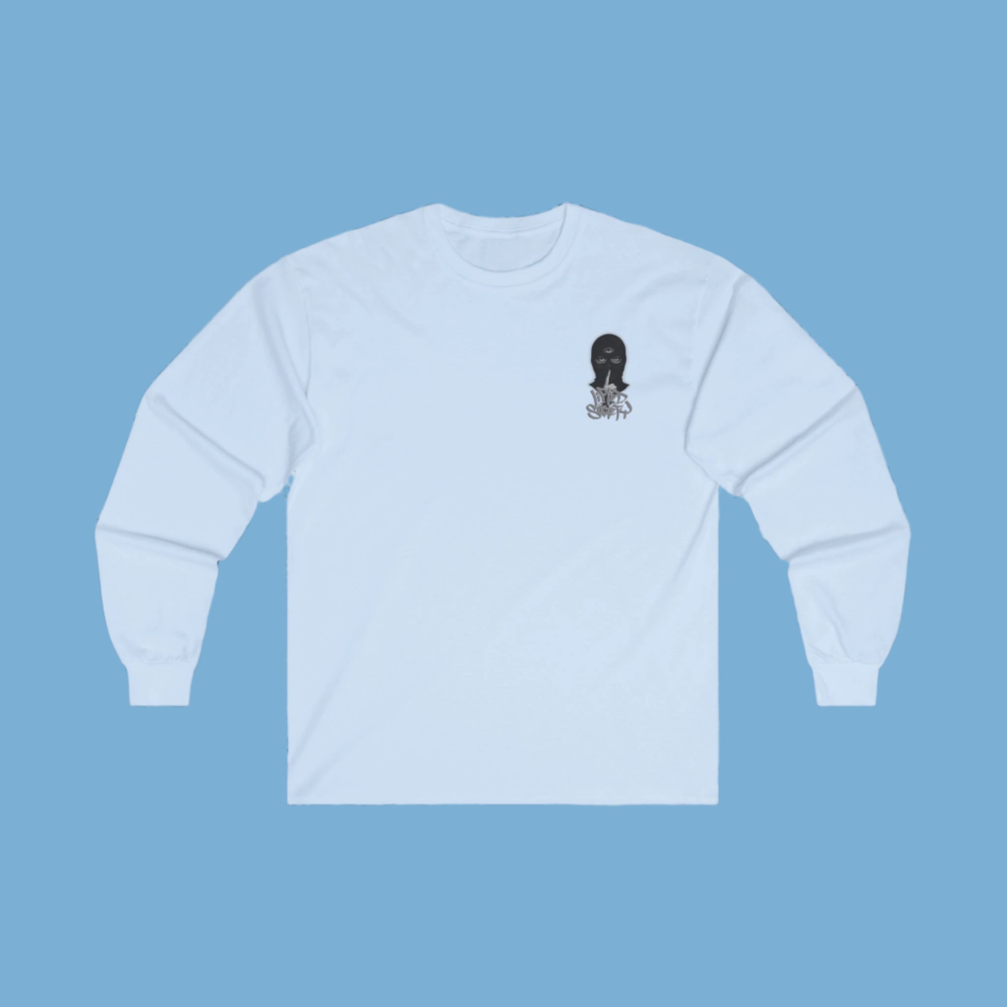 A long sleeve T-shirt in Carolina blue with a graphic of a masked person holding a finger to their lips on the front chest and the phrase 'Embrace the Unseen' on the back.
