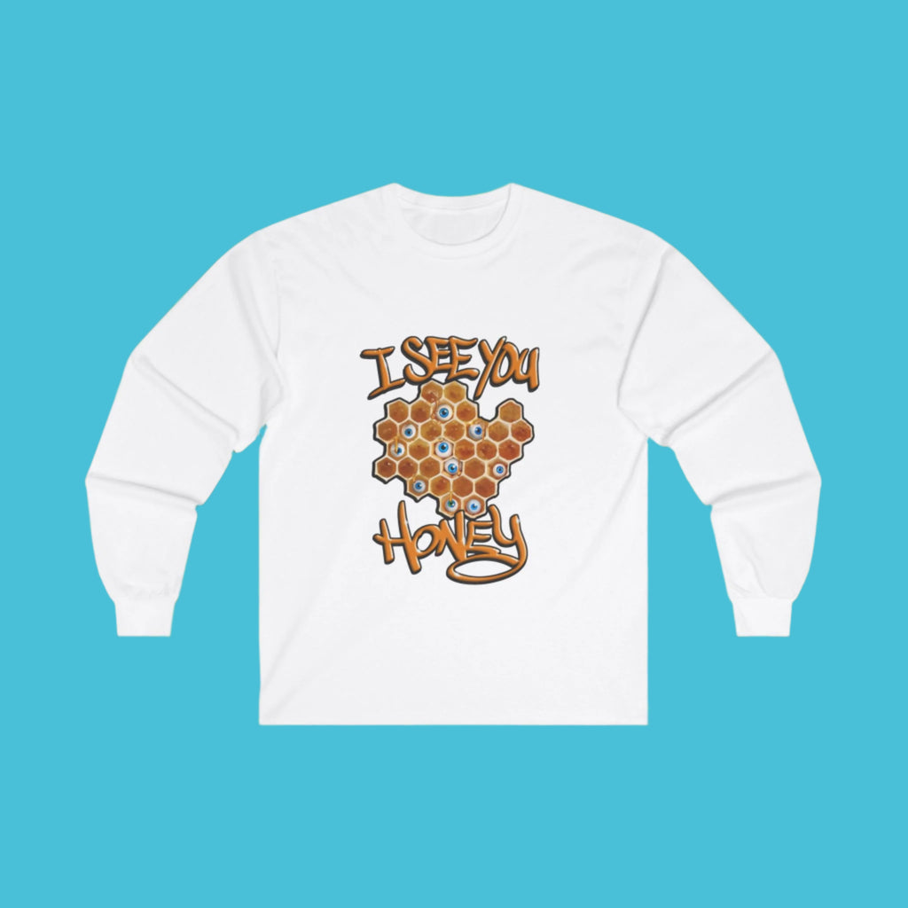 A white long sleeve T-shirt with an intricate honeycomb design and mesmerizing eyeball graphics in orange.